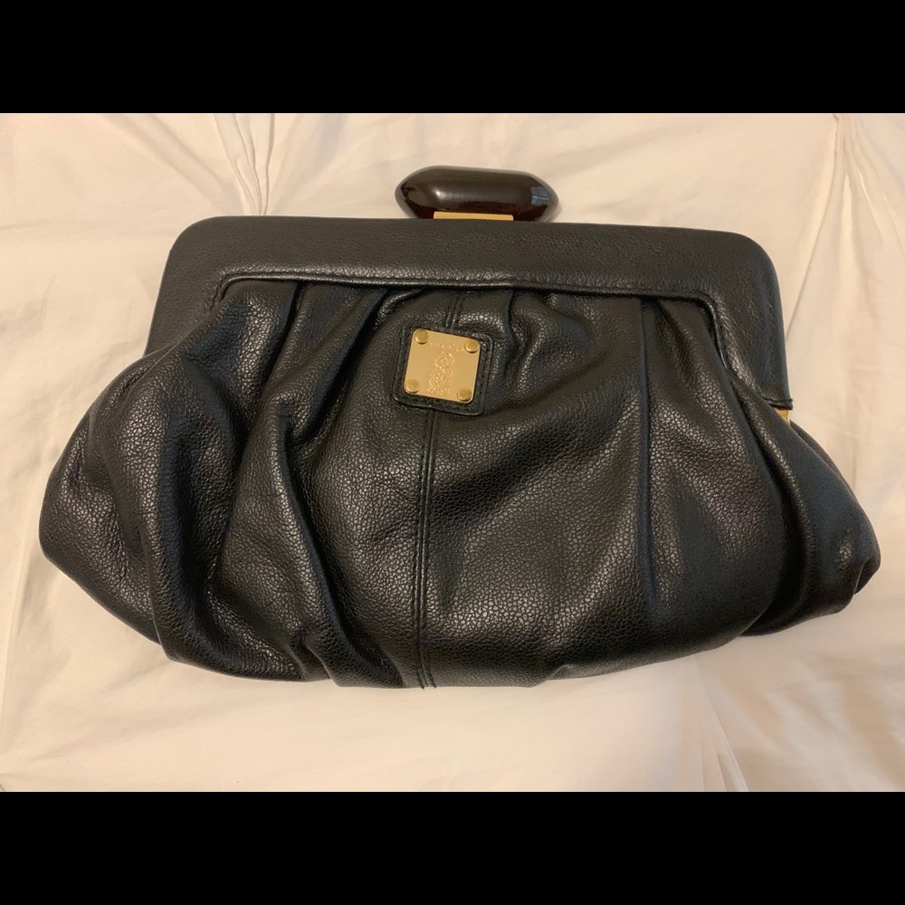 Oushka leather clutch